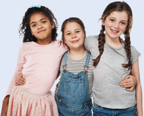 3 little girls hugging each other